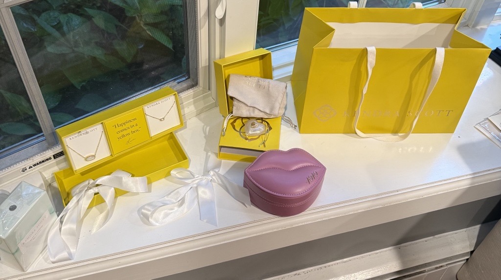 Kendra Scott jewelry basket with necklaces, bracelet, and travel case